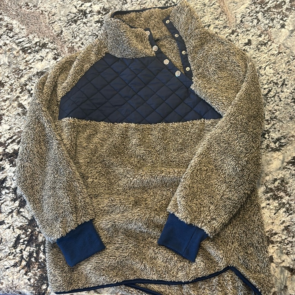 Fuzzy pull over, size medium